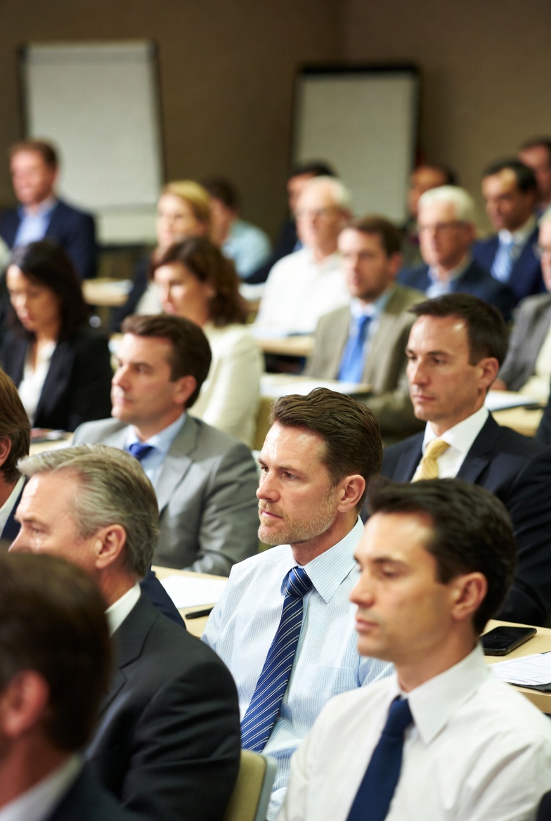 Focused audience at an executive education session